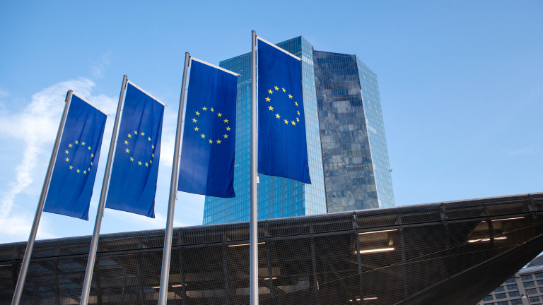 European Union flags in front of an office building